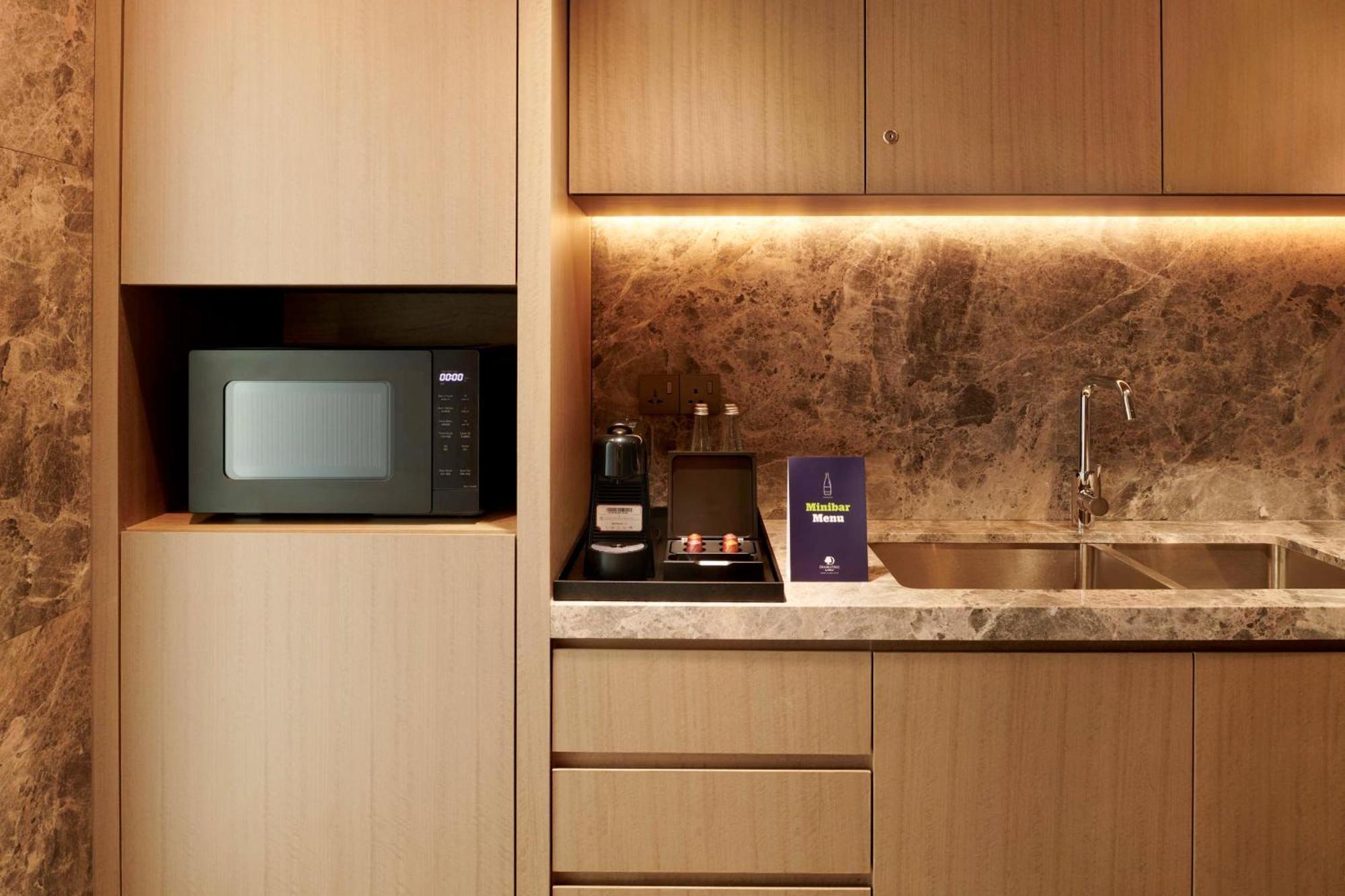 Doubletree By Hilton Shah Alam I-City Εξωτερικό φωτογραφία A microwave oven in a kitchen